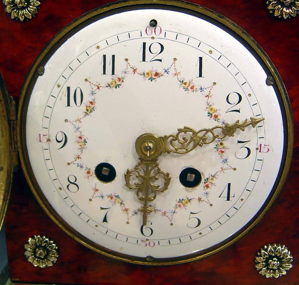 Antique French scarlet stained tortoiseshell and gilt bronze mantel clock
