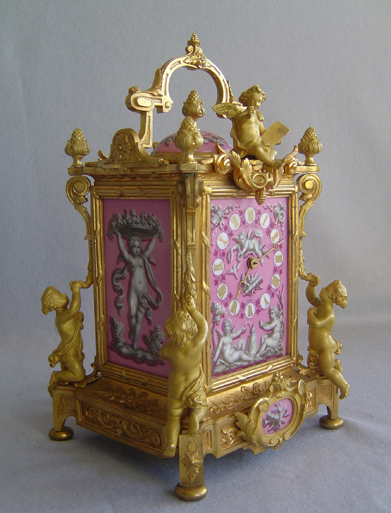 Antique French clock in pink porcelain and ormolu by Levy