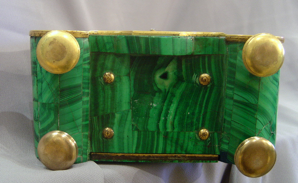 Antique Russian mantel clock veneered in Siberian malachite.