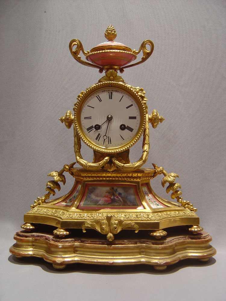 French antique pink porcelain and ormolu mantel clock.