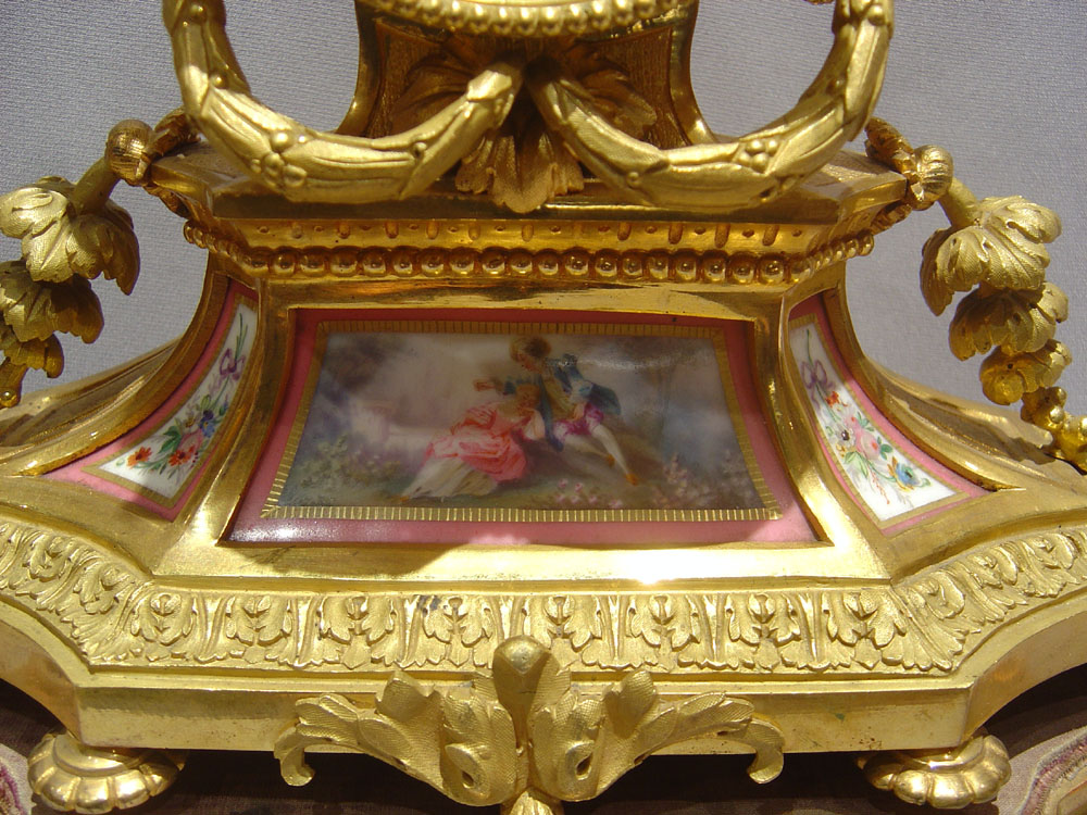 French antique pink porcelain and ormolu mantel clock.