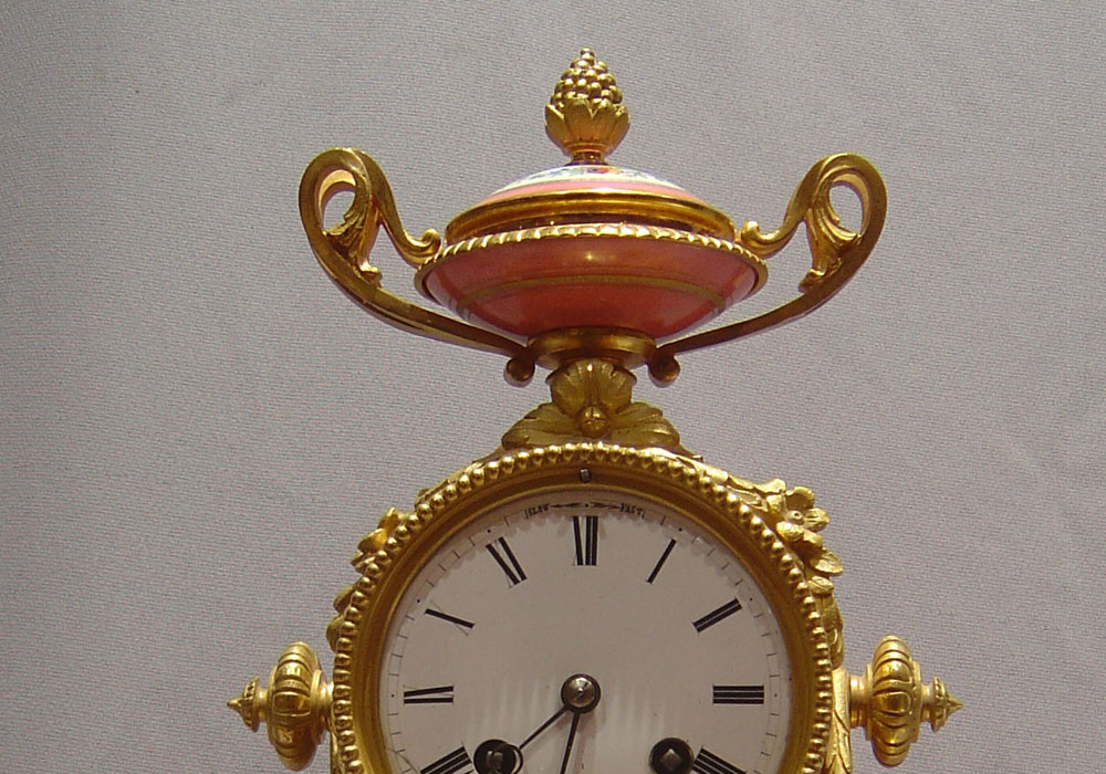 French antique pink porcelain and ormolu mantel clock.