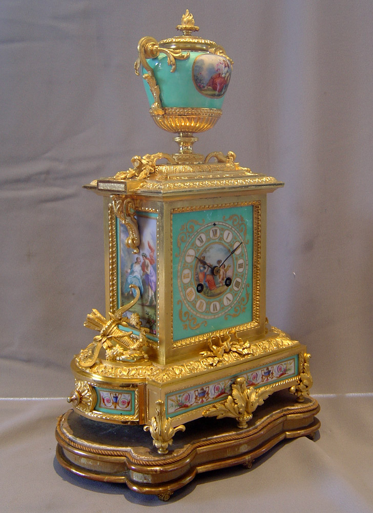Antique French turquoise porcelain and ormolu mantel clock.