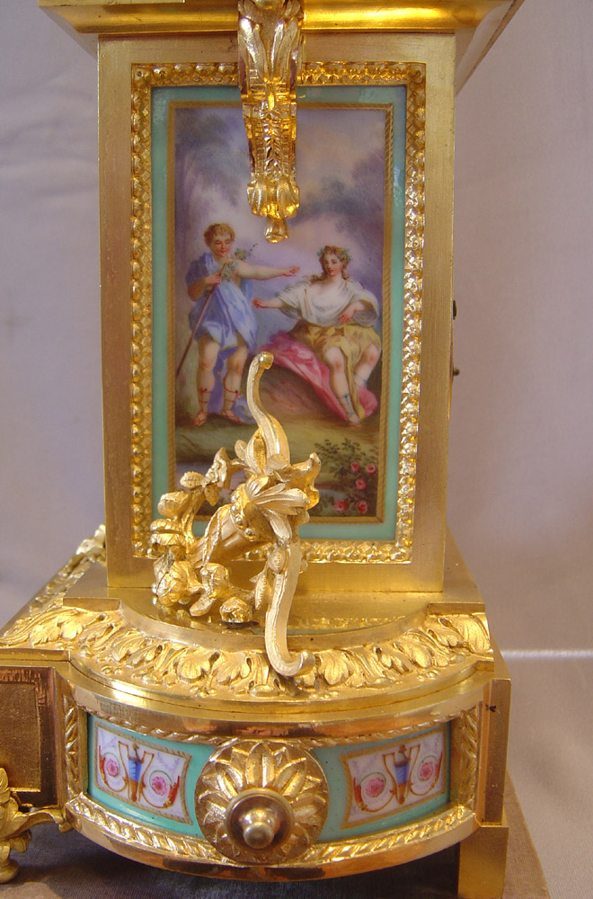 Antique French turquoise porcelain and ormolu mantel clock.