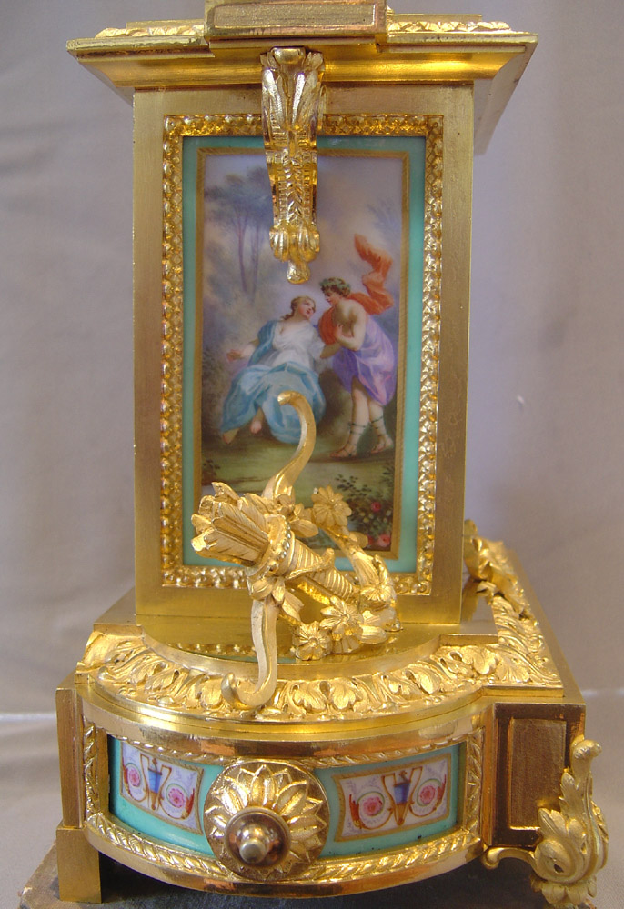 Antique French turquoise porcelain and ormolu mantel clock.