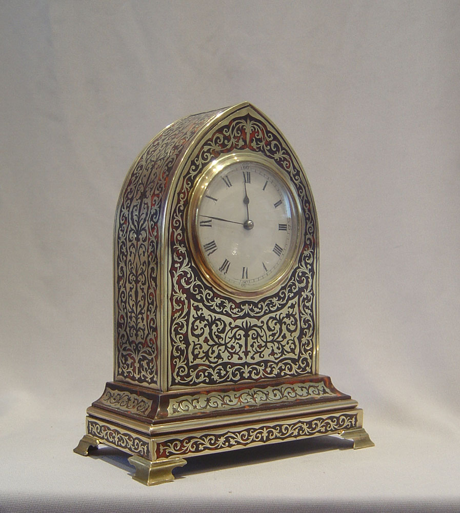 English boulle lancet shaped clock of fine quality.