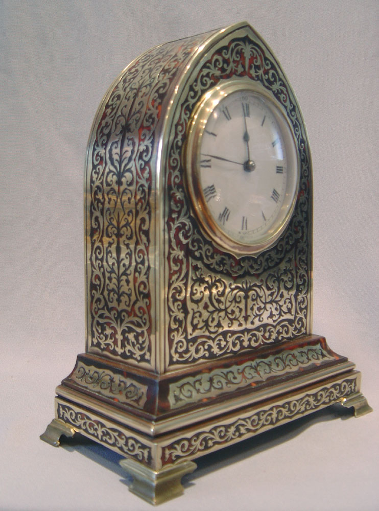 English boulle lancet shaped clock of fine quality.