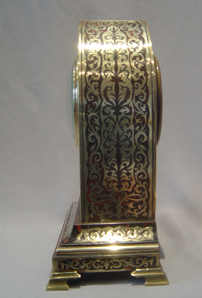 English boulle lancet shaped clock of fine quality.