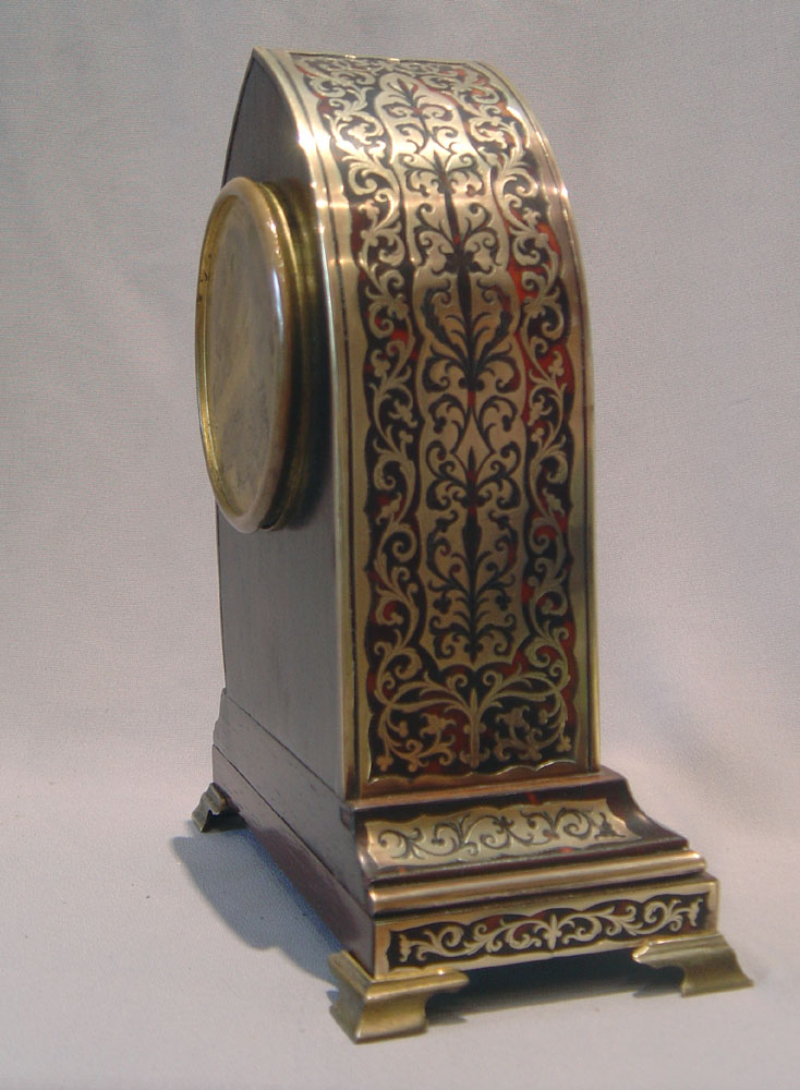 English boulle lancet shaped clock of fine quality.