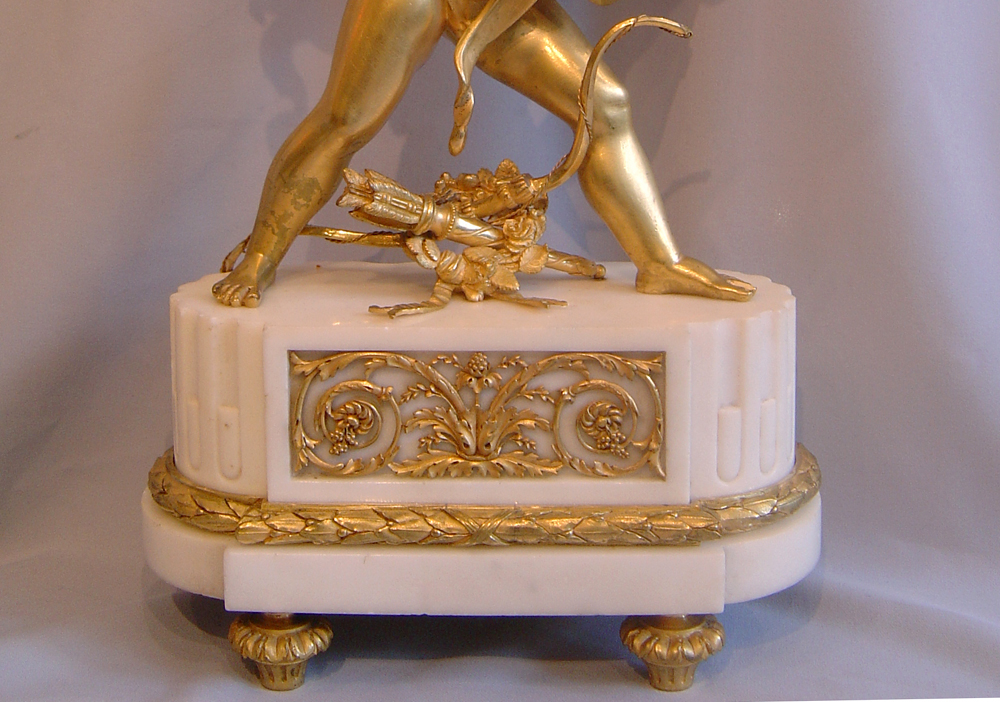 French antique Napoleon III mantel clock of Cupid carrying time.