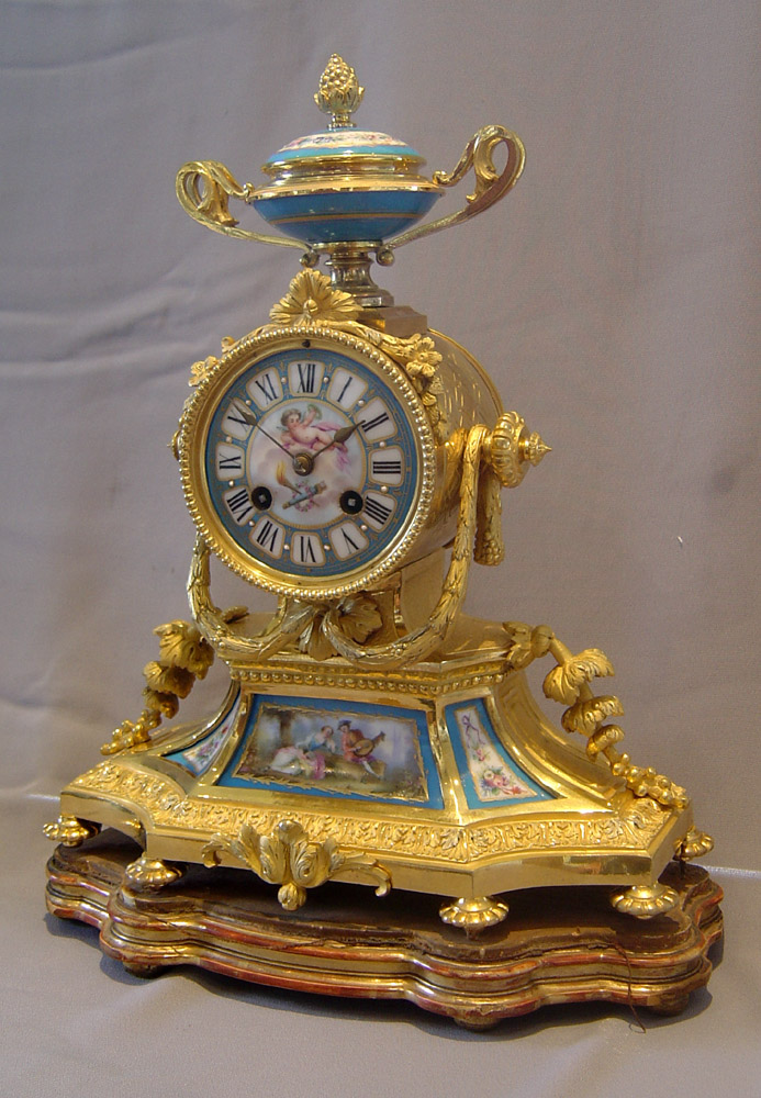 French antique ormolu and porcelain mantel clock.