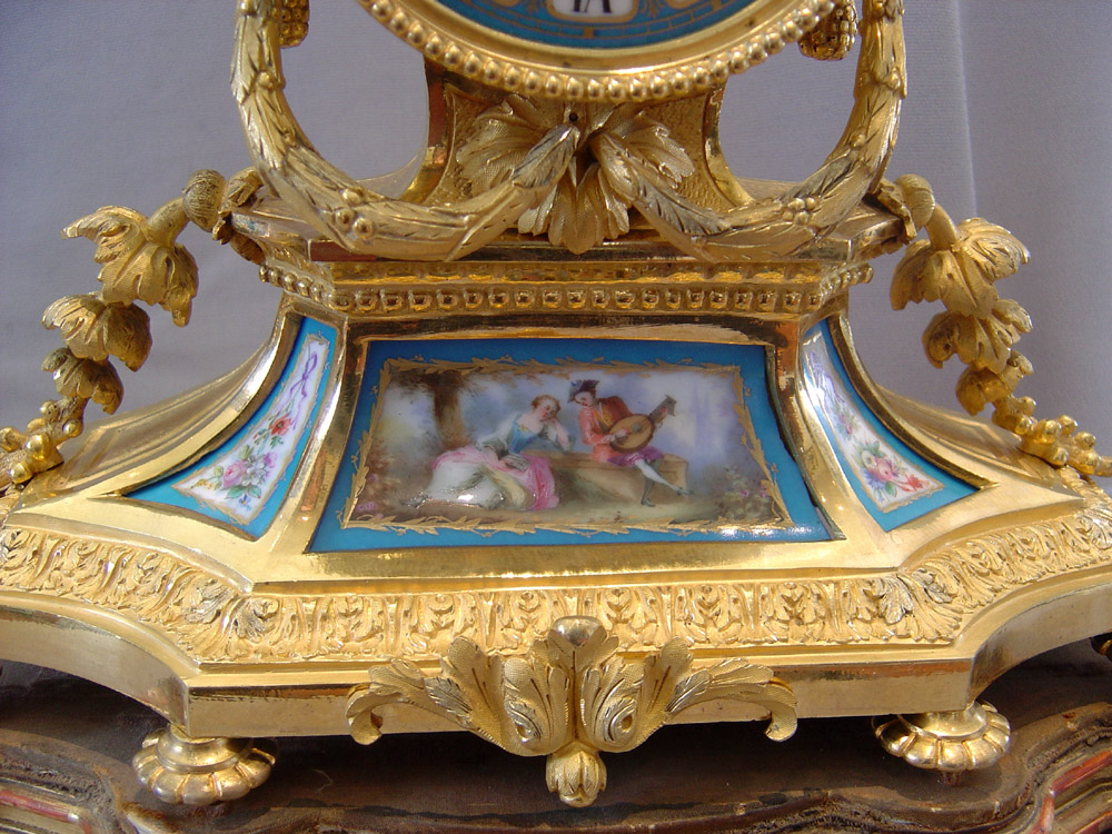 French antique ormolu and porcelain mantel clock.