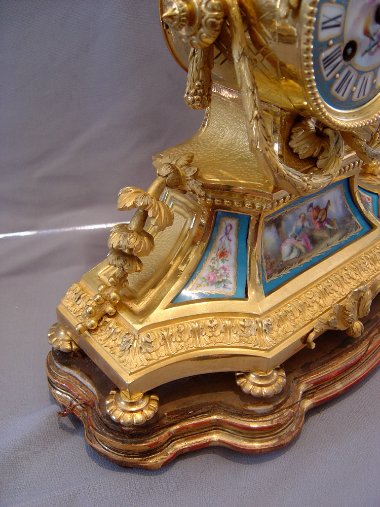 French antique ormolu and porcelain mantel clock.
