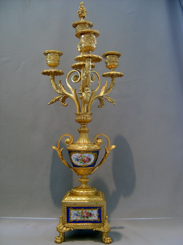 French antique clock set, clock plus candelabra in ormolu and sky blue porcelain.
