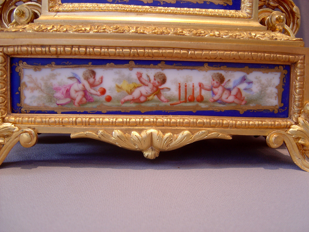 French antique clock set, clock plus candelabra in ormolu and sky blue porcelain.