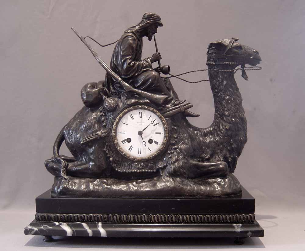 Orientalist Camel and Bedouin bronze mantel clock by Mottu a Paris.