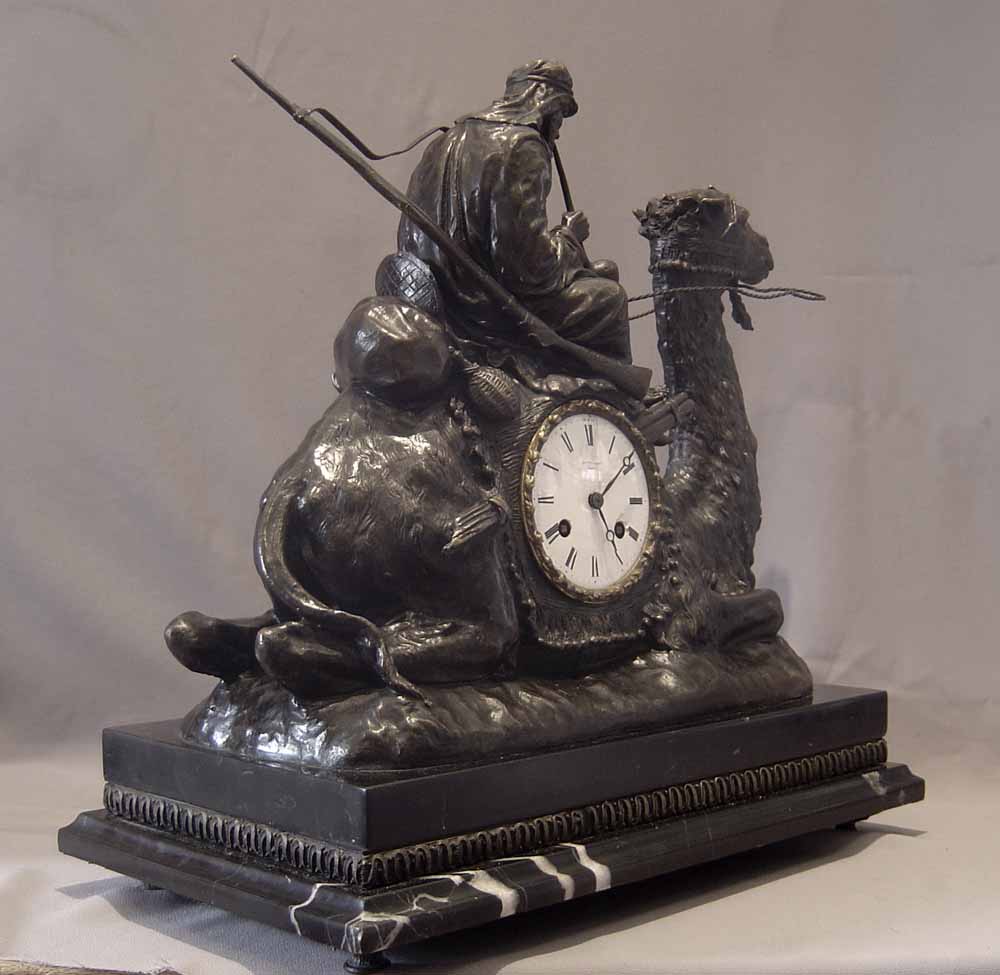 Orientalist Camel and Bedouin bronze mantel clock by Mottu a Paris.