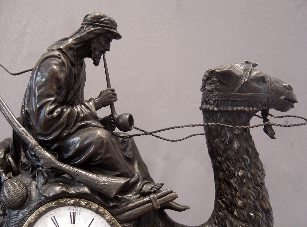 Orientalist Camel and Bedouin bronze mantel clock by Mottu a Paris.
