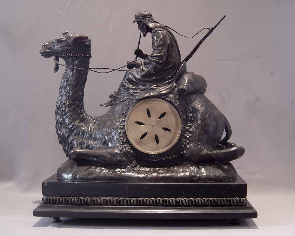 Orientalist Camel and Bedouin bronze mantel clock by Mottu a Paris.