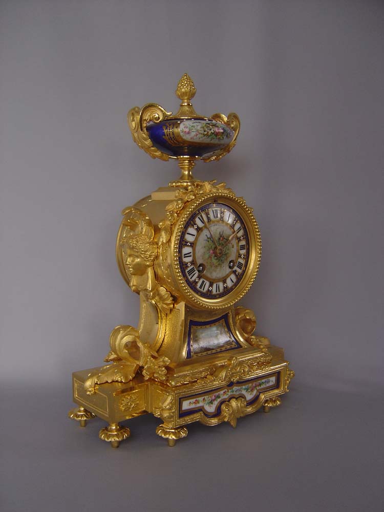 French antique ormolu and bleu du roi jewelled porcelain clock.