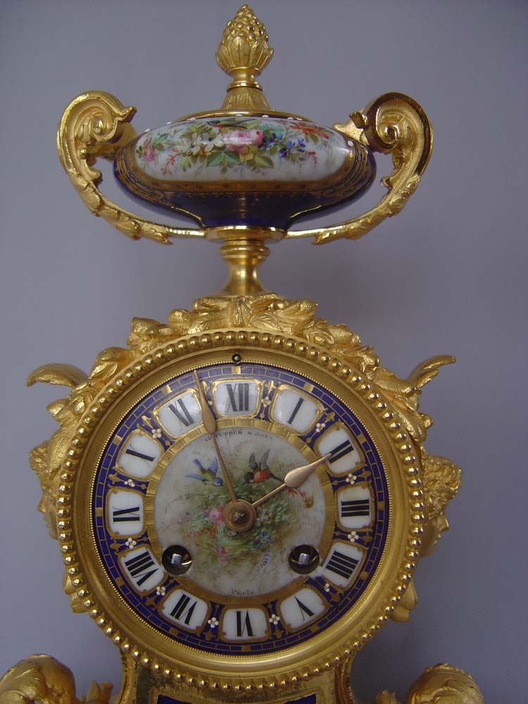 French antique ormolu and bleu du roi jewelled porcelain clock.