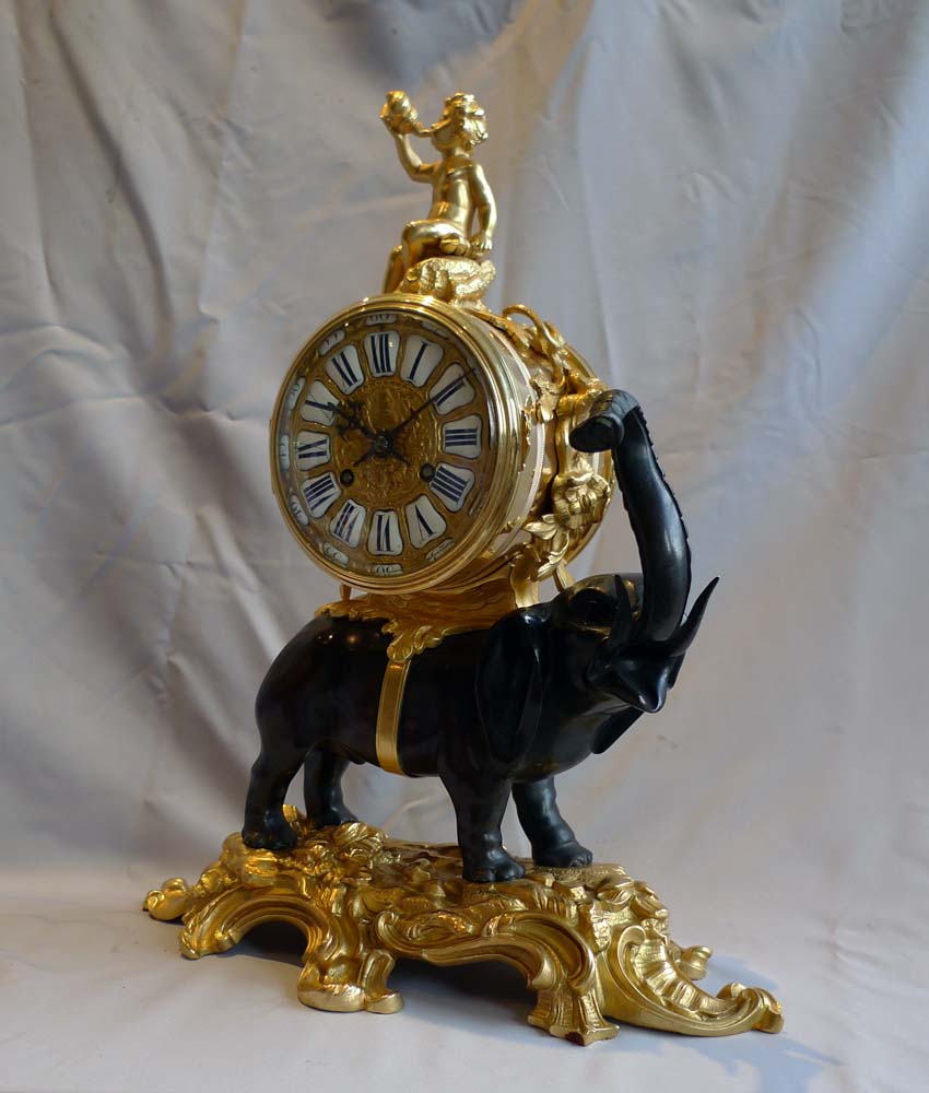 Antique Elephant clock in patinated and gilt bronze.