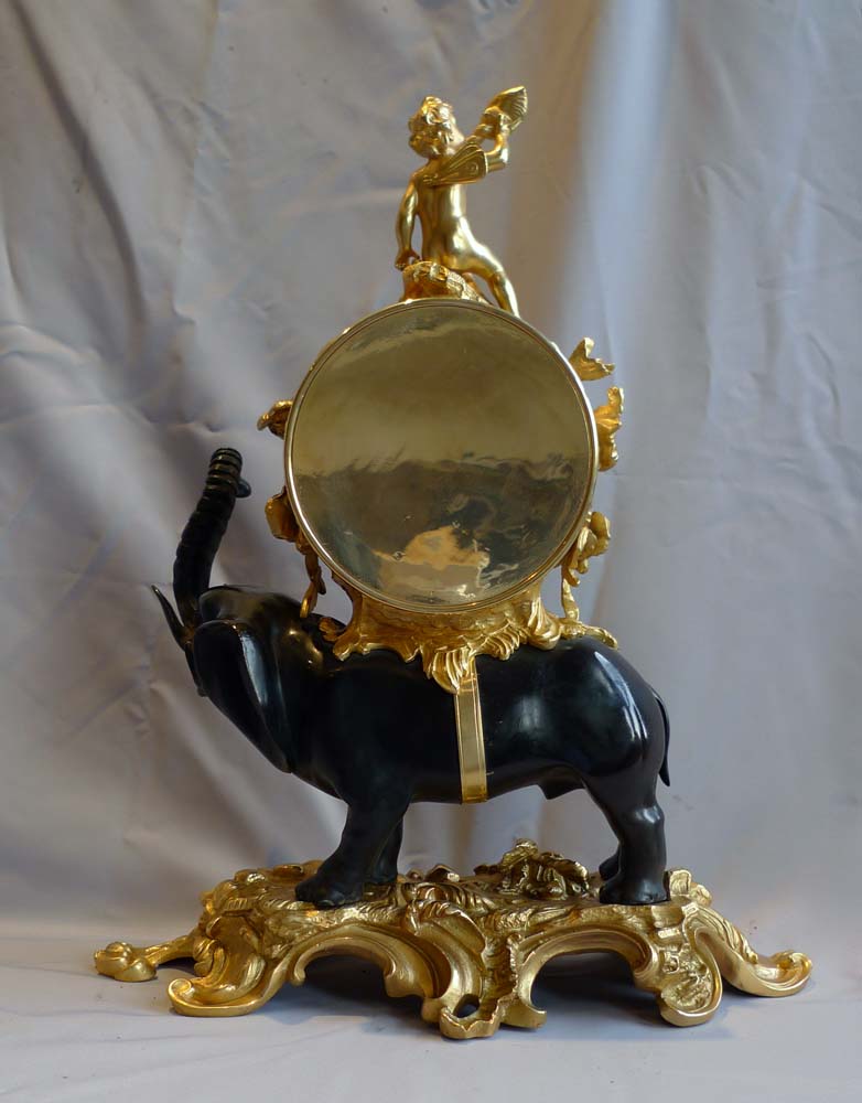 Antique Elephant clock in patinated and gilt bronze.