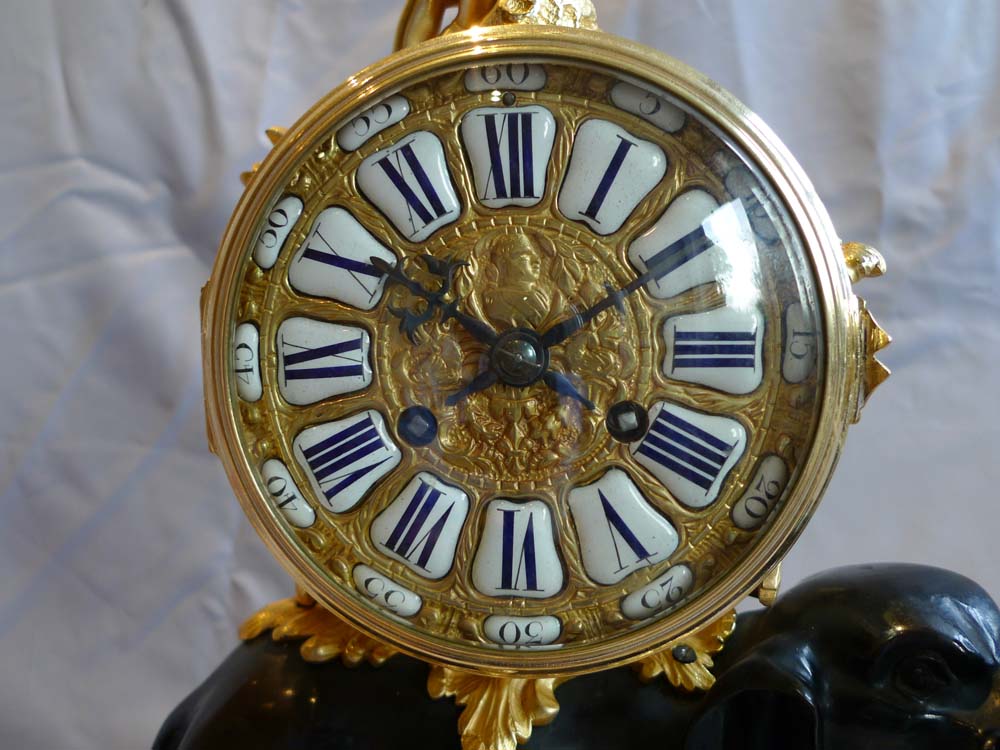 Antique Elephant clock in patinated and gilt bronze.