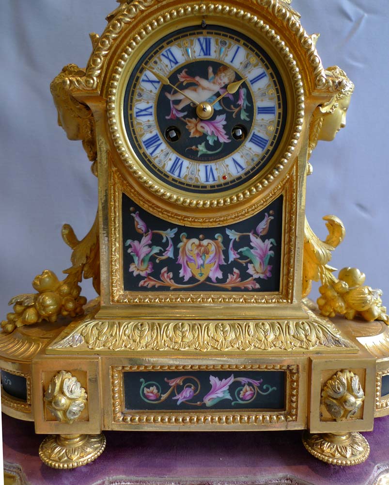 Antique mantel clock in ormolu and porcelain clock under dome.Achille Brocot
