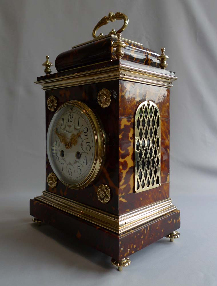 Antique tortoiseshell and gilt bronze bracket clock, English in the Queen Anne style.