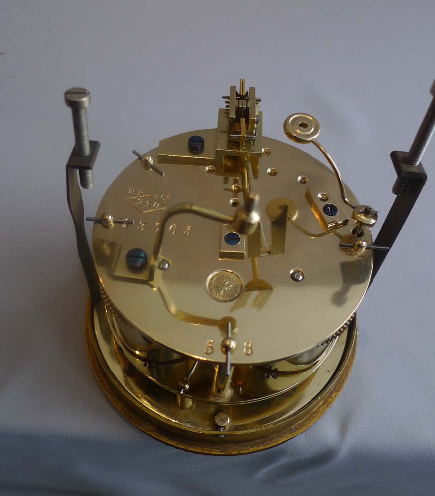 Antique French porcelain and ormolu mantel clock.