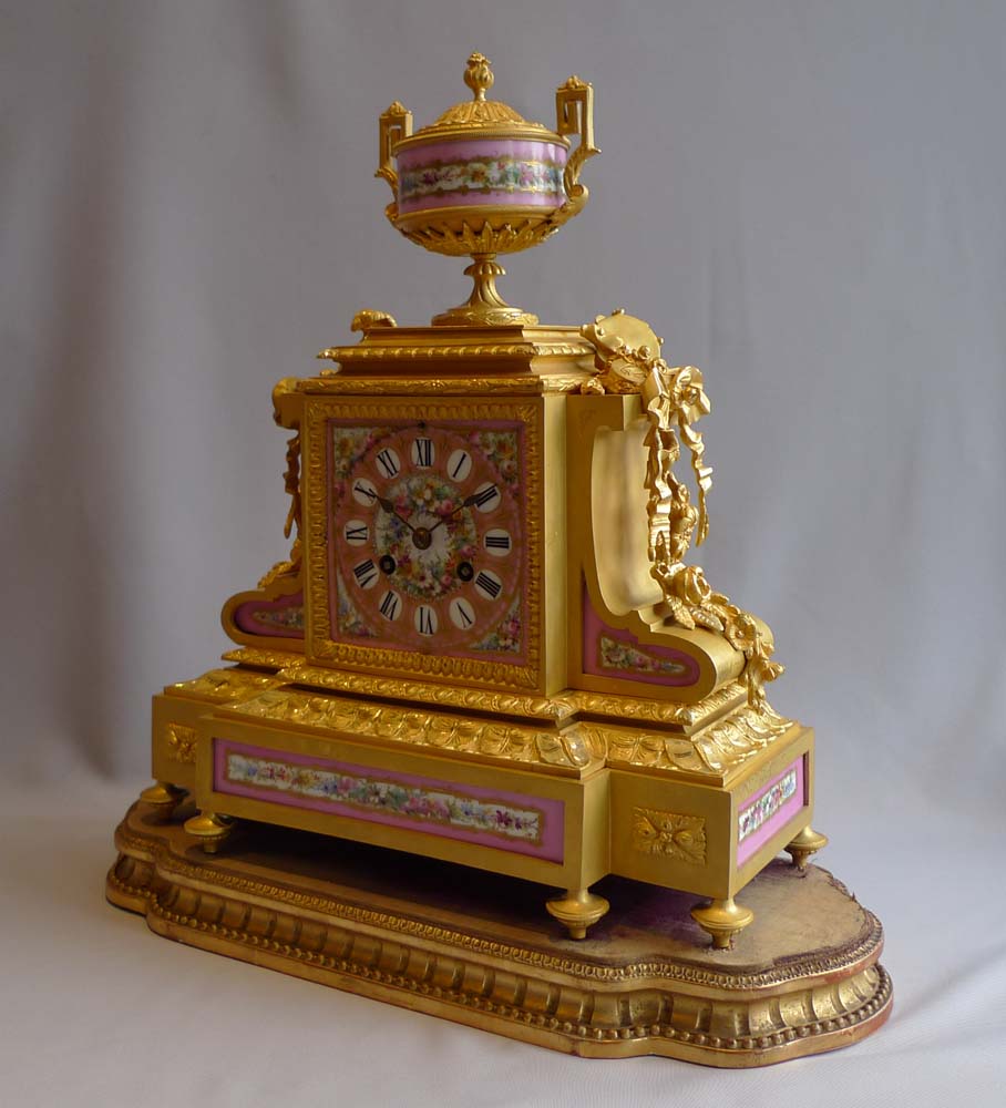 French antique pink porcelain and ormolu mantel clock.