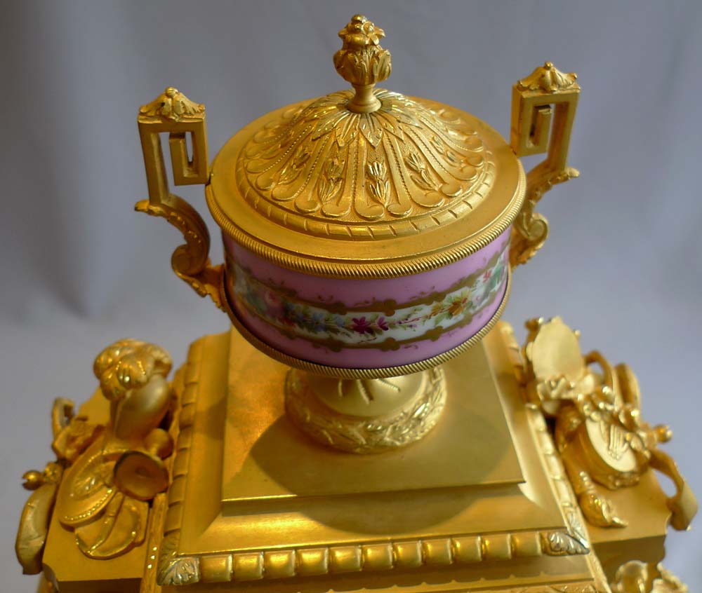 French antique pink porcelain and ormolu mantel clock.