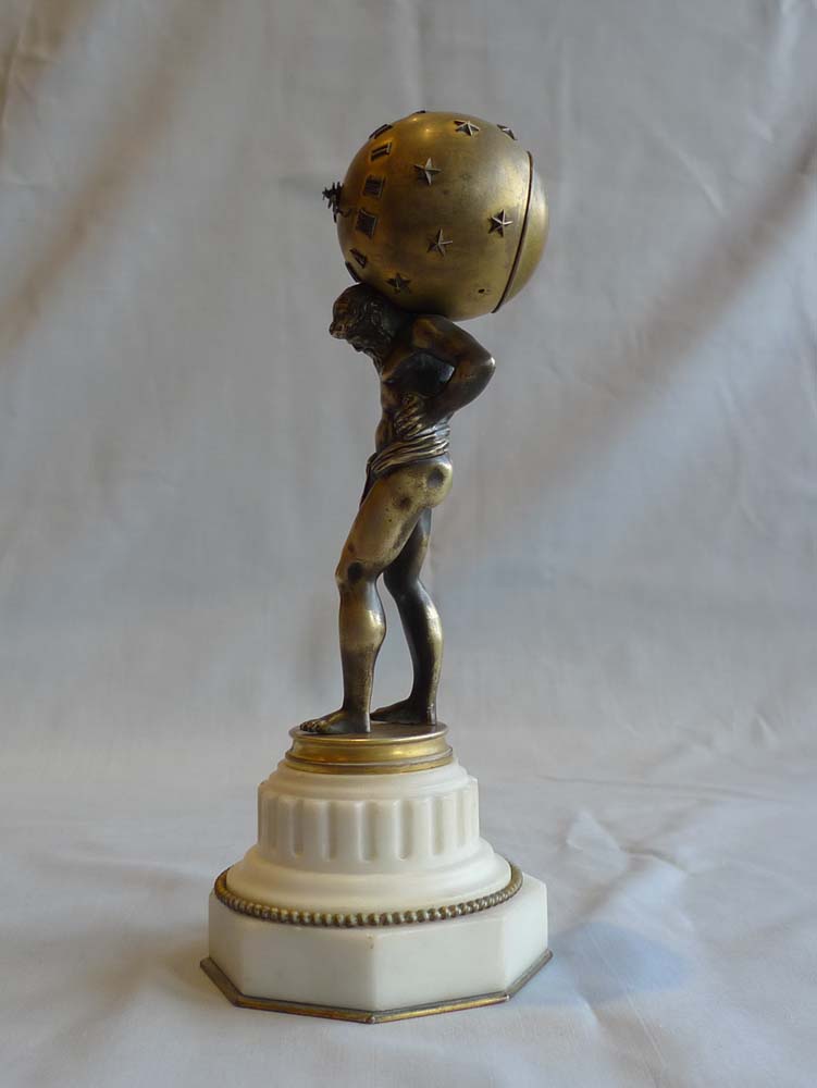 Miniature marble, ormolu and patinated bronze clock of Atlas holding up the heavens.