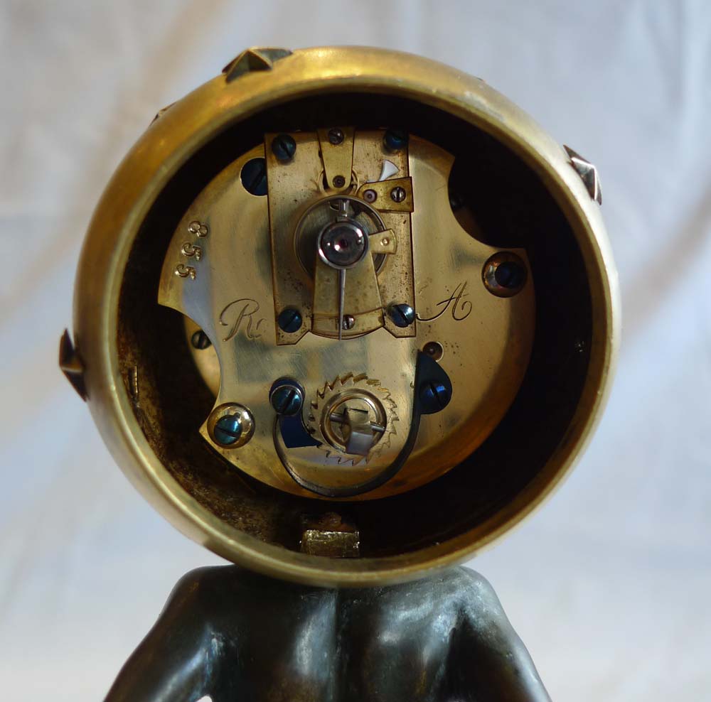 Miniature marble, ormolu and patinated bronze clock of Atlas holding up the heavens.