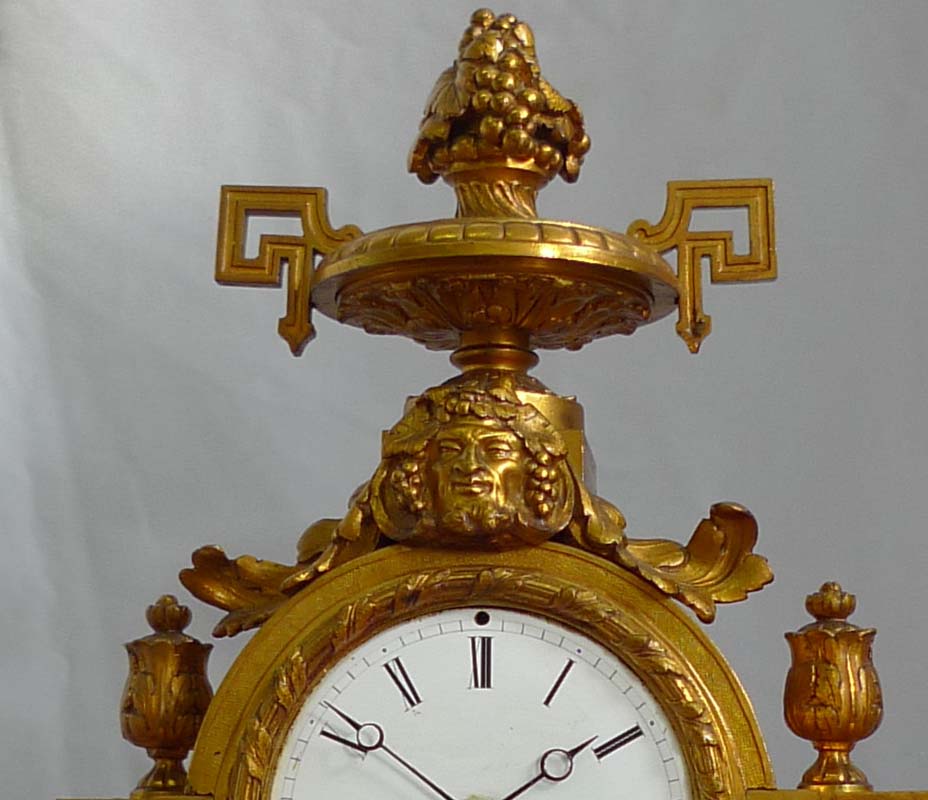 Antique French porcelain and ormolu mantel clock stamped in bronze H. Picard. And numbered