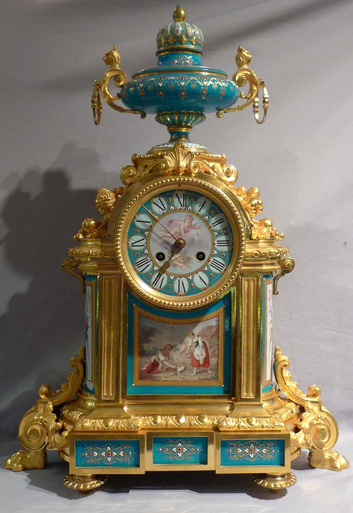 Antique very large mantel clock in ormolu and jewelled and hand painted bleu celeste porcelain.