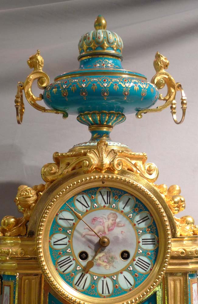 Antique very large mantel clock in ormolu and jewelled and hand painted bleu celeste porcelain.