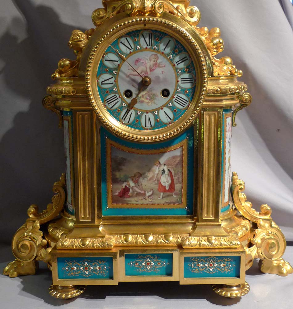 Antique very large mantel clock in ormolu and jewelled and hand painted bleu celeste porcelain.