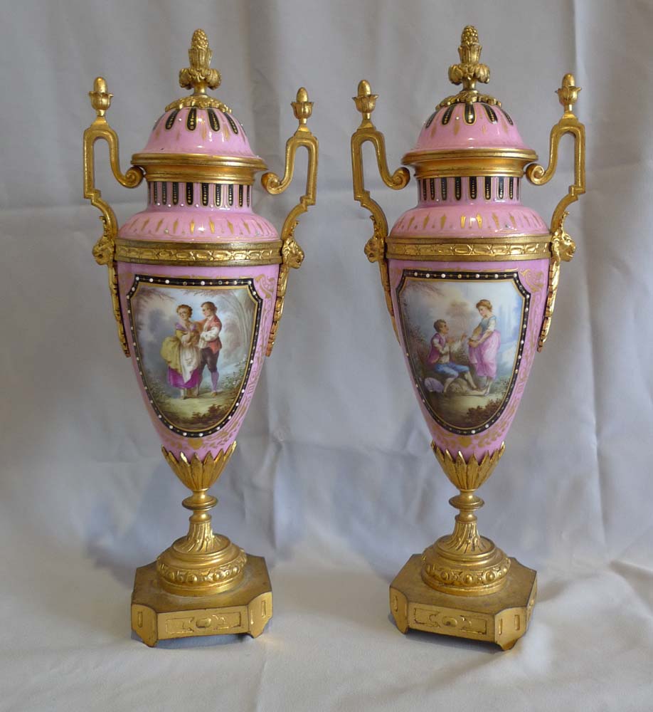 Antique French porcelain and ormolu clock set.