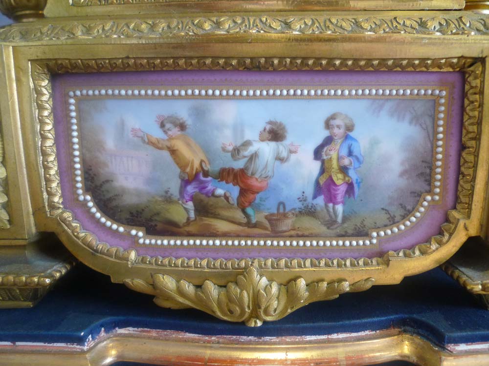 Monumental  porcelain and ormolu mantel clock by Charpentier a Paris.