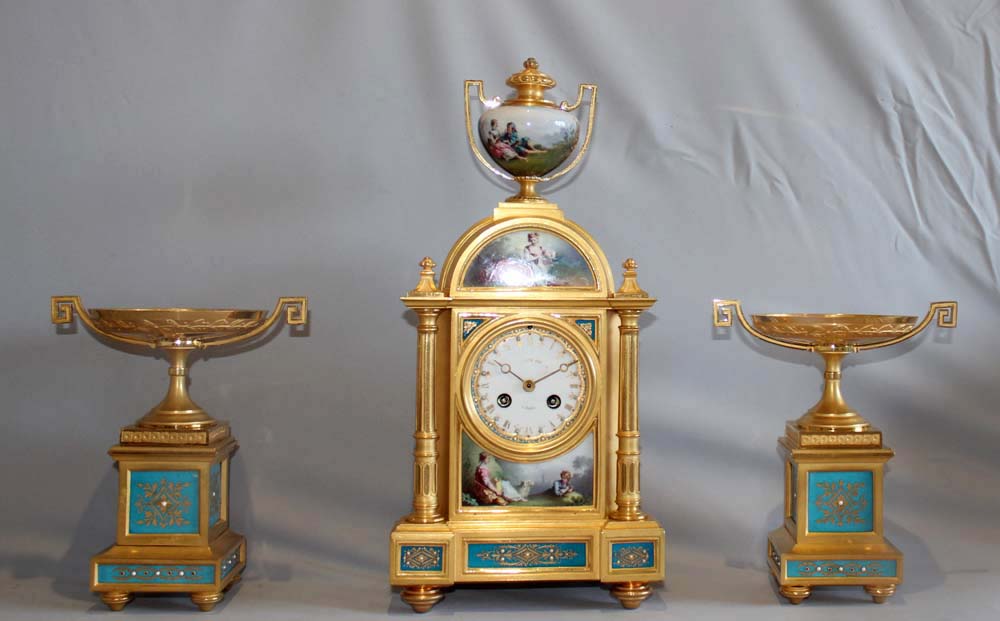 Antique French porcelain and ormolu clock set by Raingo Freres a Paris