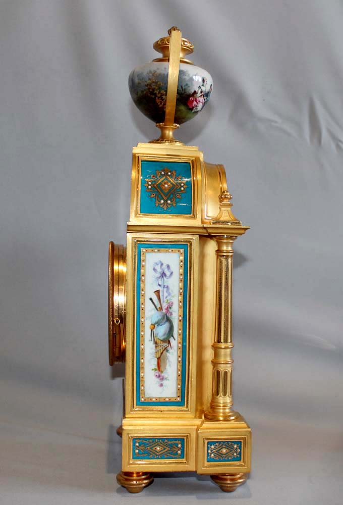 Antique French porcelain and ormolu clock set by Raingo Freres a Paris