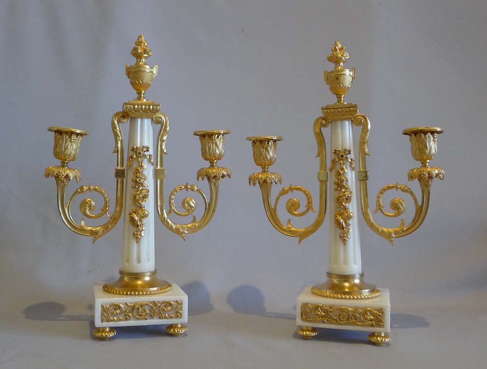 Antique French, white marble and ormolu four glass clock set.