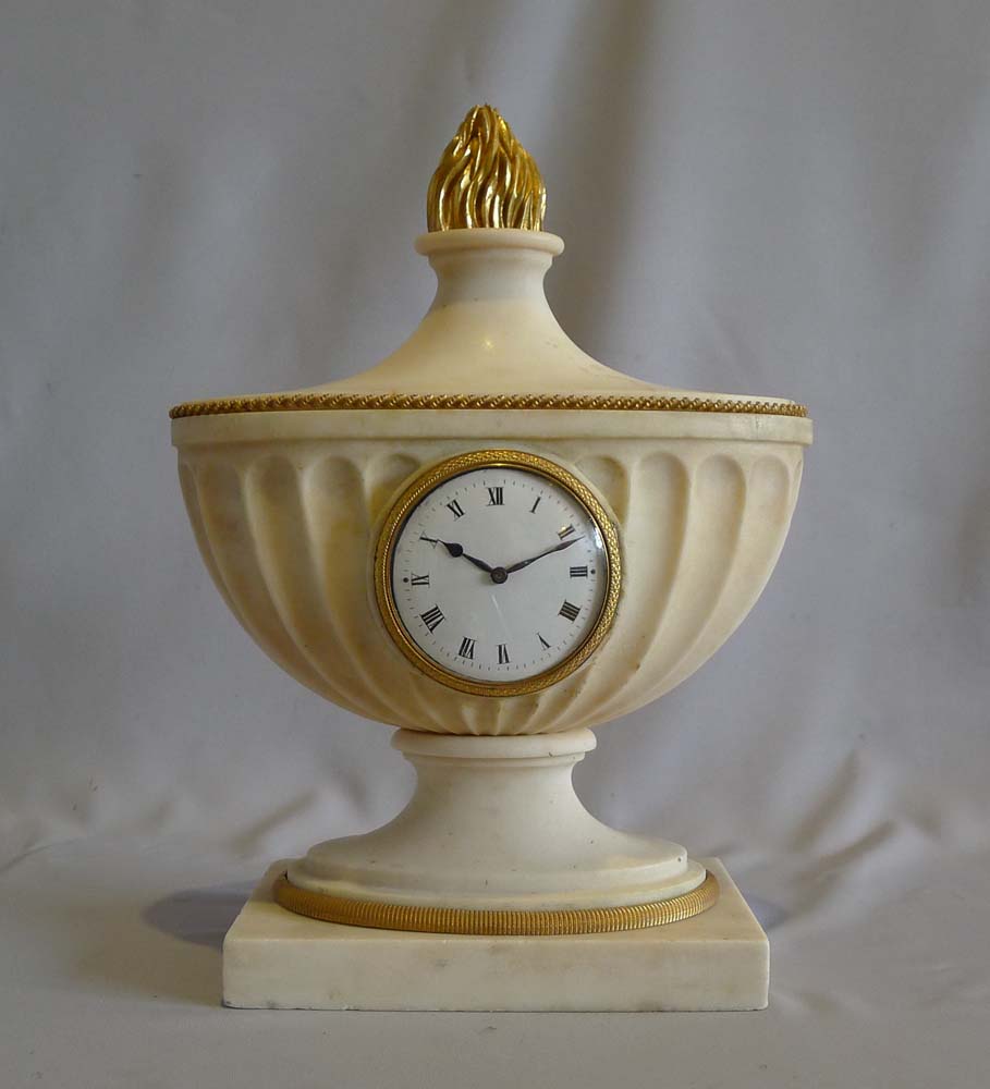 Antique ormolu mounted marble Edwardian clock of classical design.