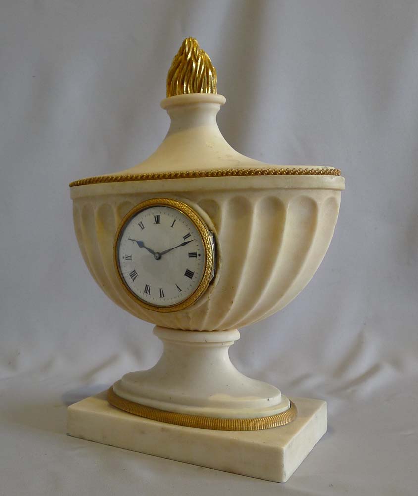 Antique ormolu mounted marble Edwardian clock of classical design.