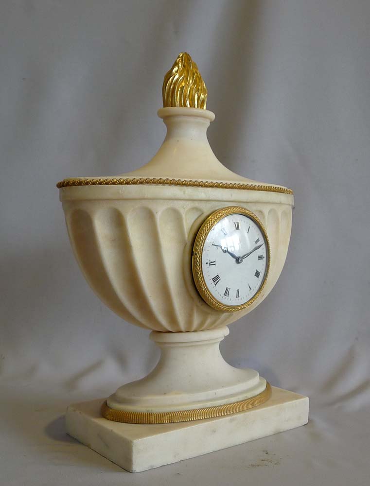 Antique ormolu mounted marble Edwardian clock of classical design.