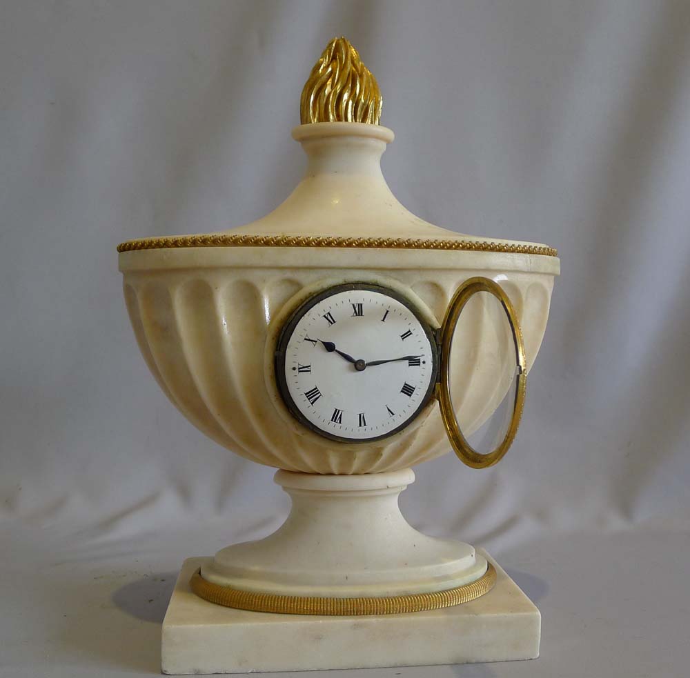 Antique ormolu mounted marble Edwardian clock of classical design.