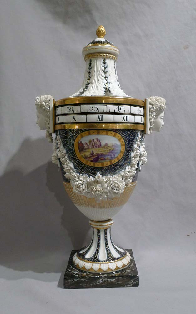 Exquisite French porcelain circe de tonneau clock.