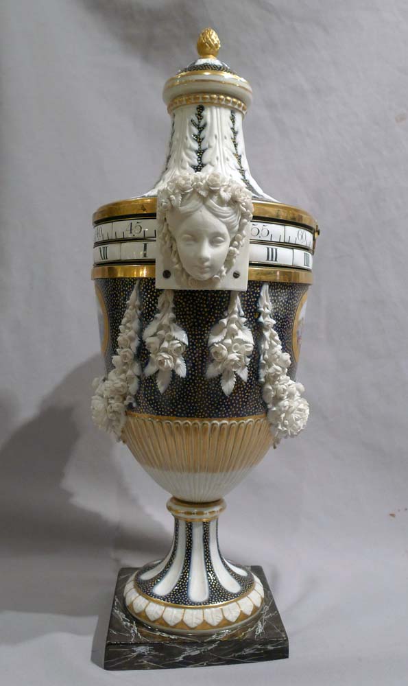 Exquisite French porcelain circe de tonneau clock.